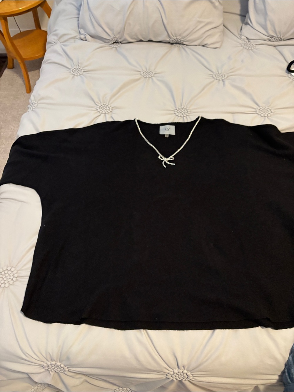 LIV Milano Black V-Neck Top with Silver Bow Accent